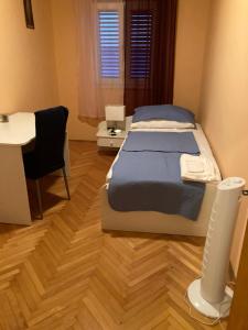 Posteľ alebo postele v izbe v ubytovaní Toni&Megi Apartment