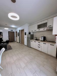 מטבח או מטבחון ב-Desiree Beach Apartment