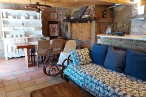a living room with a couch and a table at Sweet Stone in Vigo