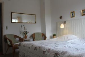 Postel nebo postele na pokoji v ubytování Klithjem Badehotel
