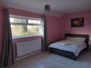 Postel nebo postele na pokoji v ubytování Pace home