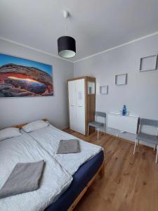 Postel nebo postele na pokoji v ubytování Pokoje Fiesta