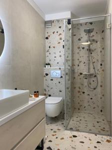Et badeværelse på Apartment Luris