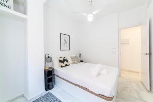 Postel nebo postele na pokoji v ubytování Trendy Homes Alfarerías