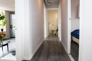 Postel nebo postele na pokoji v ubytování Ruim appartement in monumentaal gebouw