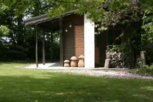 a group of logs sitting on the side of a building at Landhaus Rössle in Schwäbisch Hall