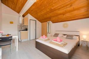 Kuchyň nebo kuchyňský kout v ubytování Apartments Ivka