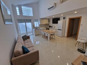 TV a/nebo společenská místnost v ubytování Villa Alameda by Atlantichotels