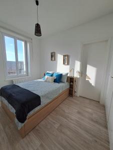 Llit o llits en una habitació de Le Rayon Vert vue mer