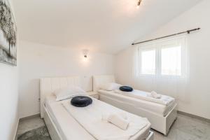 Ένα ή περισσότερα κρεβάτια σε δωμάτιο στο Villa Noemi +28 φωτογραφίες