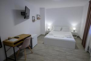 Postel nebo postele na pokoji v ubytování Vila RD