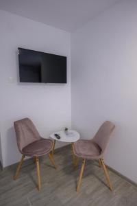 TV a/nebo společenská místnost v ubytování Vila RD