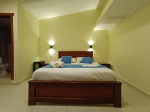 Voodi või voodid majutusasutuse Hostal CañaLimeña toas