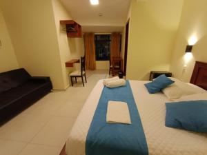 Voodi või voodid majutusasutuse Hostal CañaLimeña toas