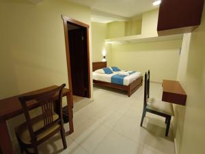 Voodi või voodid majutusasutuse Hostal CañaLimeña toas