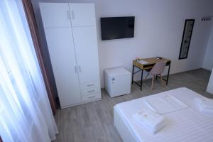 Postel nebo postele na pokoji v ubytování Vila RD