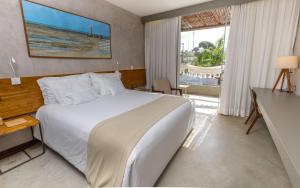 Postel nebo postele na pokoji v ubytování Flor de Lis Exclusive Hotel