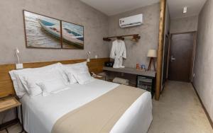 Postel nebo postele na pokoji v ubytování Flor de Lis Exclusive Hotel