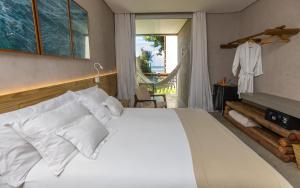 Postel nebo postele na pokoji v ubytování Flor de Lis Exclusive Hotel