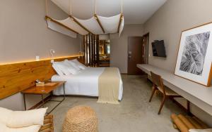Postel nebo postele na pokoji v ubytování Flor de Lis Exclusive Hotel