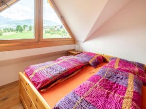 Voodi või voodid majutusasutuse Apartment in Mariapfarr near Ski Slopes toas