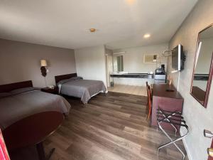 Afbeelding uit fotogalerij van Budget Inn of Mena in Mena