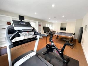 Fitness center at/o fitness facilities sa Cottage Retreat - Historic Cottage Home w Home Gym