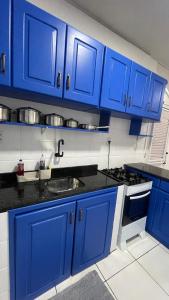 Kuchyň nebo kuchyňský kout v ubytování Apartamento no Atalaia