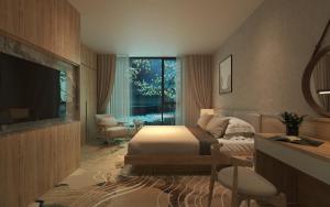a bedroom with a bed and a television in it at Fukurai Boutique Apartments Ha Noi in Hanoi