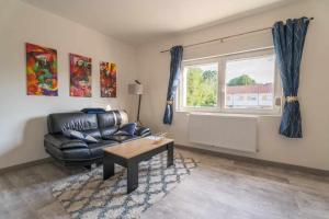 Część wypoczynkowa w obiekcie Le Cosy 120m² - 4 chambres - 8 personnes