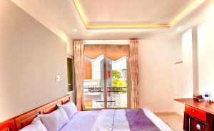 Postelja oz. postelje v sobi nastanitve Hotel Hoàng Thịnh