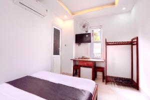 Postelja oz. postelje v sobi nastanitve Hotel Hoàng Thịnh