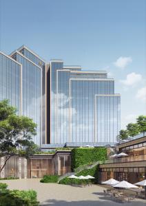 a rendering of a building with tall buildings at Dorsett Kai Tak in Hong Kong