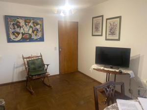 TV a/nebo společenská místnost v ubytování Depto Boulevard Illia