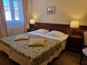 Krevet ili kreveti u jedinici u okviru objekta Taanilinna Hotell