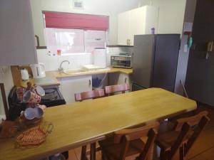 Kitchen o kitchenette sa Ramsgate Palms Unit 58
