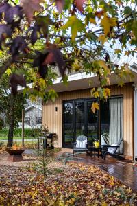 a screened in porch of a house at Dal Zotto Homestead & Studios in Whitfield