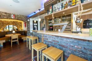 Lounge nebo bar v ubytování Triton