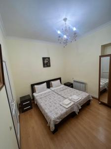 Voodi või voodid majutusasutuse Arm Hotel toas
