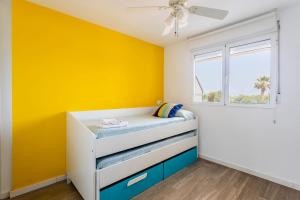 Postel nebo postele na pokoji v ubytování Fantástico Apartamento en Primerísima Línea Playa
