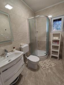 Kúpeľňa v ubytovaní Apartmani Malo more Seline