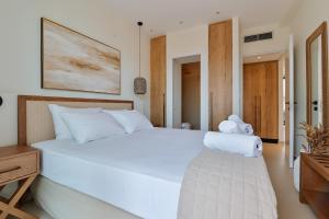 Postel nebo postele na pokoji v ubytování Melior Luxury Villas