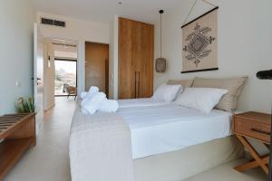 Postel nebo postele na pokoji v ubytování Melior Luxury Villas + 34 fotografií