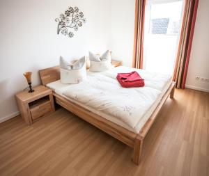 Postel nebo postele na pokoji v ubytování Ferienwohnung Sandstrand