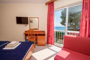 TV a/nebo společenská místnost v ubytování Centinera Resort