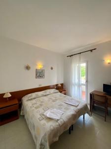 Postel nebo postele na pokoji v ubytování Bed & Breakfast Alex