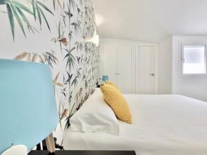Łóżko lub łóżka w pokoju w obiekcie Summer Breeze Penthouse