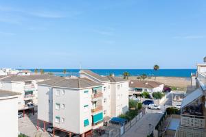an aerial view of buildings and the ocean at Atico Duplex Pepe y Rosi in Cunit