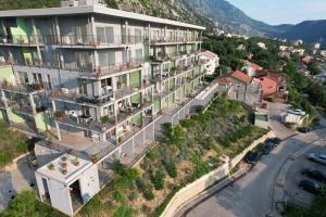 an aerial view of a building in a city at Hotel Credo in Kotor