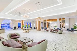 Pickalbatros Villaggio Aqua Park - Portofino Marsa Alam的休息区